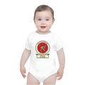 Baby wearing the Build Your Own Badge personalized Christmas bodysuit in White, with HEAD ELF IN CHARGE on the name plate